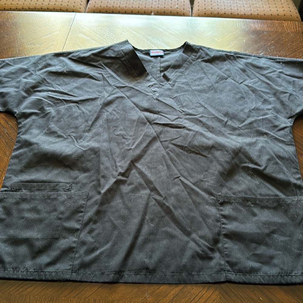 I no longer wear. Tons of life left. V neck. Tags cut. Xl